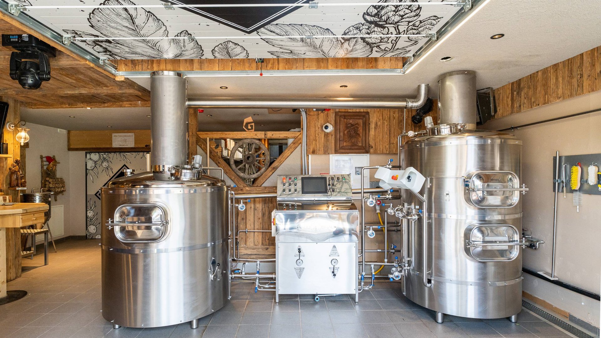 The Gratznbräu brewery Modern stainless steel brewing equipment in a brewery with wooden interior