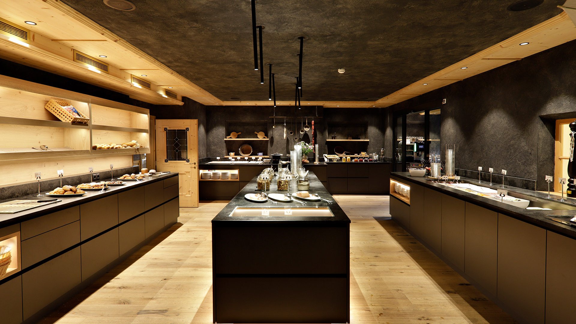 Gourmet haven Erlebnisort Gassenhof Modern rustic kitchen with buffet and wooden floor